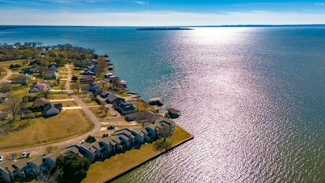 birds eye view of property with a residential view and a water view