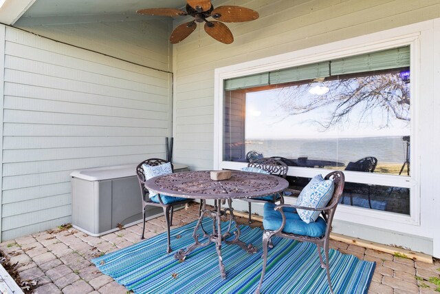 view of patio featuring ceiling fan
