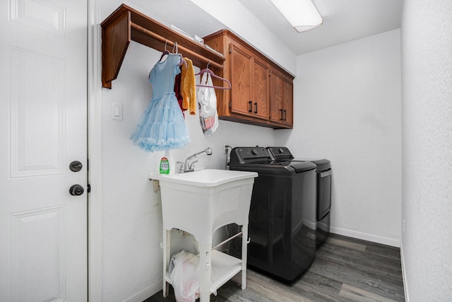 39 Alexander Ct, Angleton, TX 77515 - laundry room with independent washer and dryer, cabinet space, baseboards, and wood finished floors