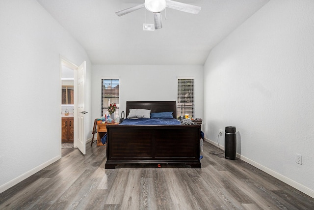 39 Alexander Ct, Angleton, TX 77515 - bedroom featuring vaulted ceiling, wood finished floors, baseboards, and a ceiling fan