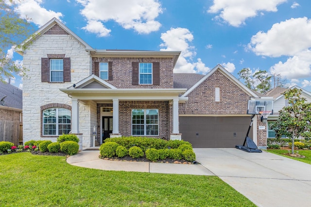 view of front of house with driveway, stone siding, fence, brick siding, and a front yard