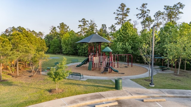 community play area featuring a lawn