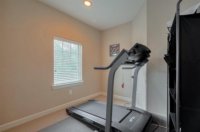 workout room featuring baseboards, carpet flooring, and recessed lighting