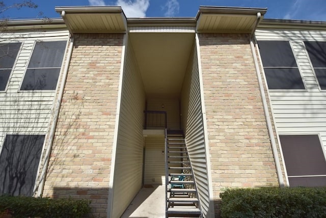 2300 Augusta Dr Unit 36, Houston, TX 77057 - view of side of property featuring stairway and brick siding