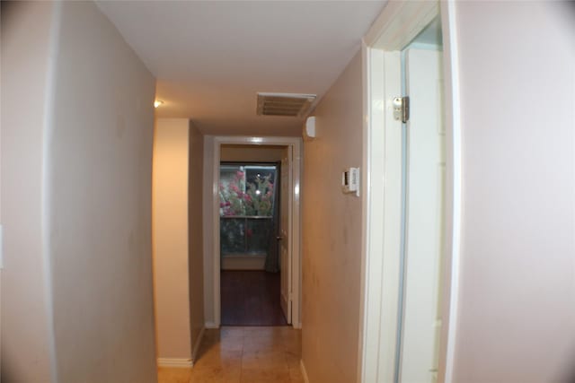 2300 Augusta Dr Unit 36, Houston, TX 77057 - hallway with light tile patterned flooring, baseboards, and visible vents