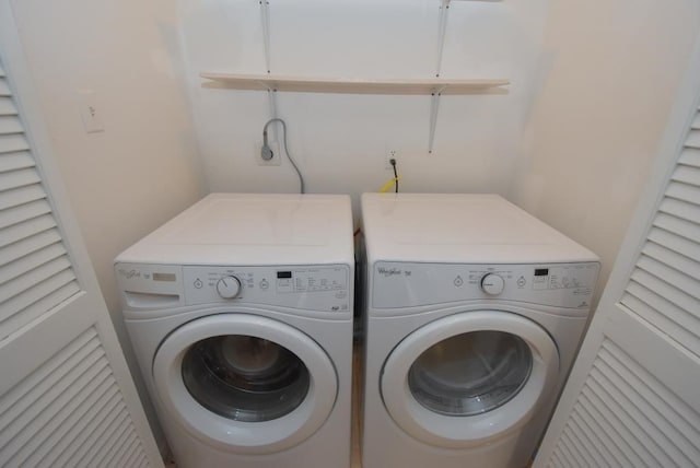 2300 Augusta Dr Unit 36, Houston, TX 77057 - clothes washing area with washer and clothes dryer and laundry area