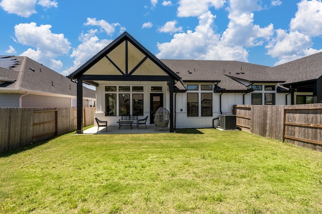 16958 Chapel Knox Dr, Humble, TX 77346 - back of property with a yard, a fenced backyard, and cooling unit