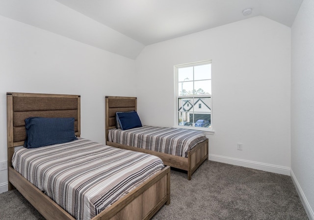 16958 Chapel Knox Dr, Humble, TX 77346 - bedroom with baseboards, carpet, and vaulted ceiling