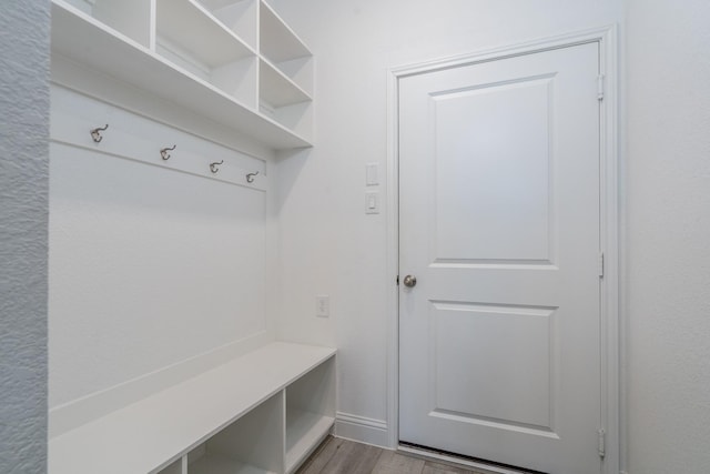 16958 Chapel Knox Dr, Humble, TX 77346 - mudroom featuring baseboards and wood finished floors