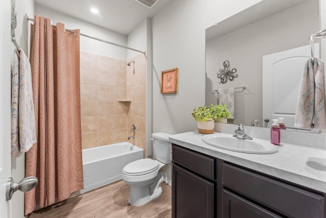 15038 Eastern Wood Rd, Magnolia, TX 77354 - bathroom with toilet, shower / bath combination with curtain, wood finished floors, and vanity