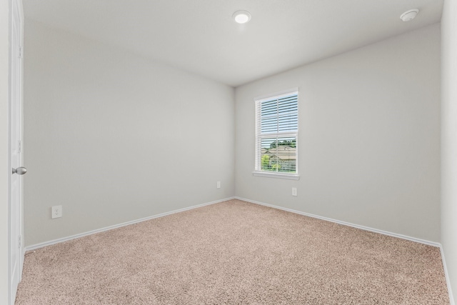15038 Eastern Wood Rd, Magnolia, TX 77354 - carpeted empty room featuring baseboards
