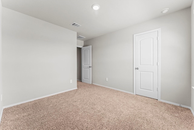 15038 Eastern Wood Rd, Magnolia, TX 77354 - unfurnished bedroom with baseboards, carpet flooring, and visible vents