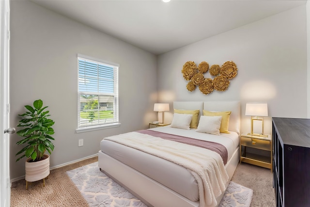 15038 Eastern Wood Rd, Magnolia, TX 77354 - bedroom with baseboards and light carpet