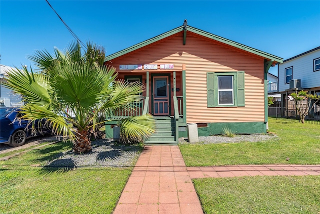 2216 Grover Ave, Galveston, TX 77551 - view of front of home featuring a porch and crawl space