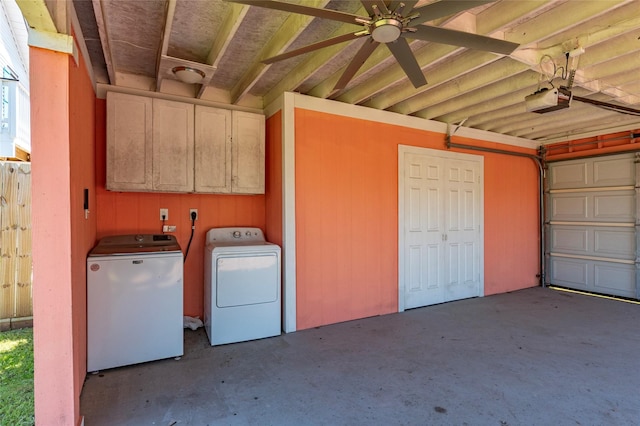 2216 Grover Ave, Galveston, TX 77551 - garage with independent washer and dryer, a garage door opener, and a ceiling fan