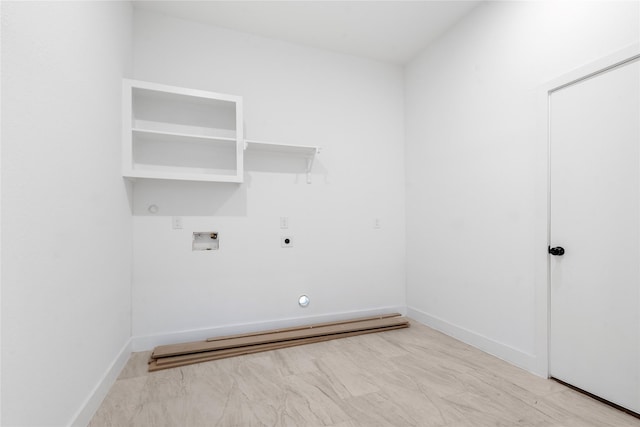laundry room featuring laundry area, hookup for a washing machine, electric dryer hookup, baseboard heating, and gas dryer hookup