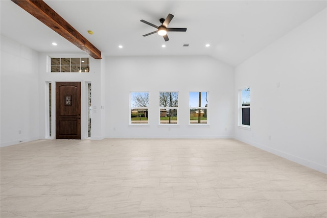 unfurnished living room with recessed lighting, plenty of natural light, baseboards, and beamed ceiling