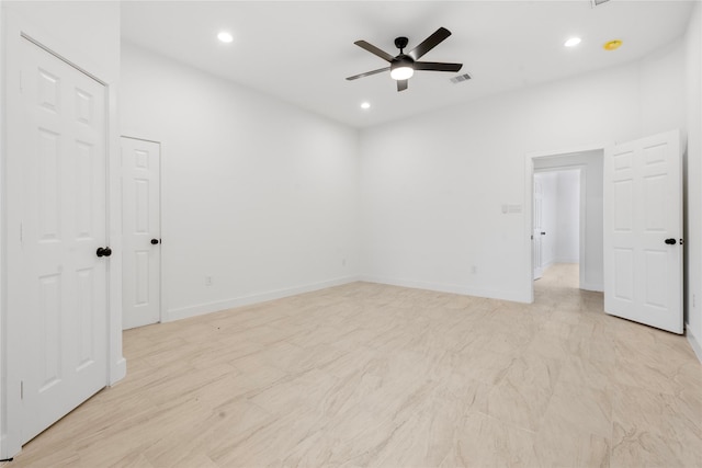 empty room with recessed lighting, visible vents, baseboards, and a ceiling fan