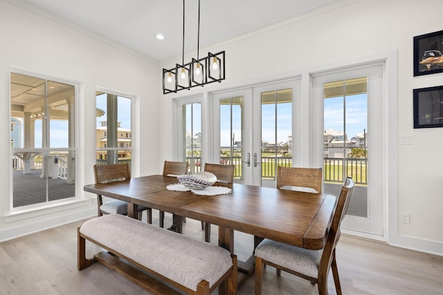 11370 Beachside, Galveston, TX 77554 - dining area with french doors, baseboards, light wood-type flooring, and recessed lighting