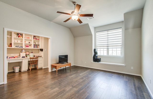 interior space with visible vents, baseboards, a ceiling fan, dark wood finished floors, and lofted ceiling