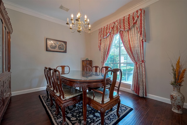 dining room featuring a chandelier, baseboards, ornamental molding, and visible vents
