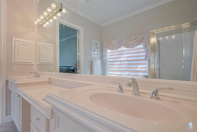 bathroom featuring tile patterned floors, double vanity, a sink, and ornamental molding