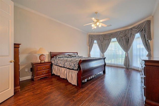 bedroom featuring multiple windows, access to outside, dark wood-style flooring, and ornamental molding