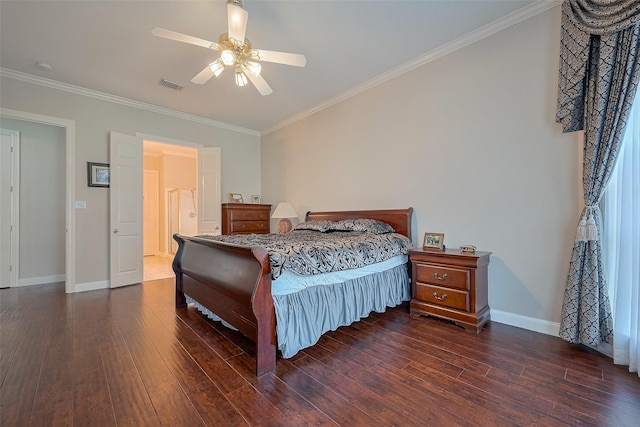 bedroom featuring baseboards, visible vents, dark wood-style flooring, and ornamental molding