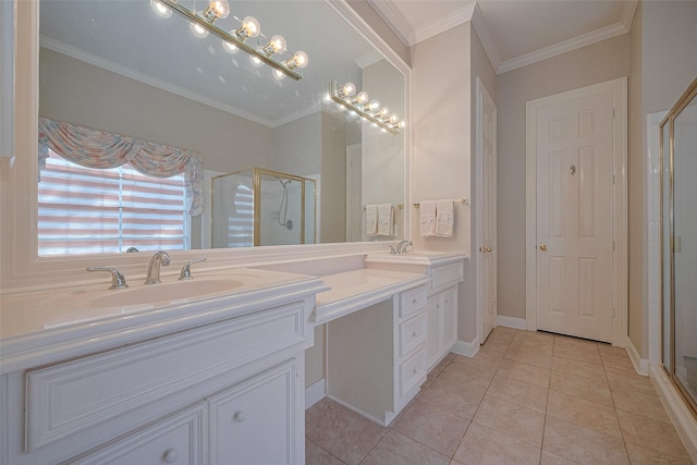 bathroom with a sink, a shower stall, double vanity, and tile patterned flooring