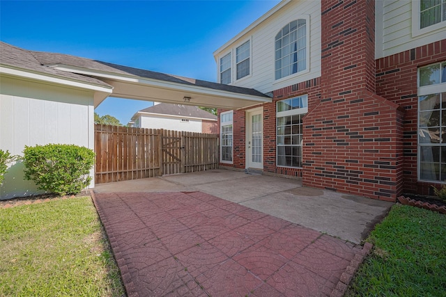 view of patio featuring fence