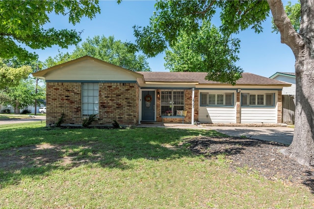 4103 Donna Lynn Dr, Houston, TX 77092 - ranch-style home with a front yard and brick siding