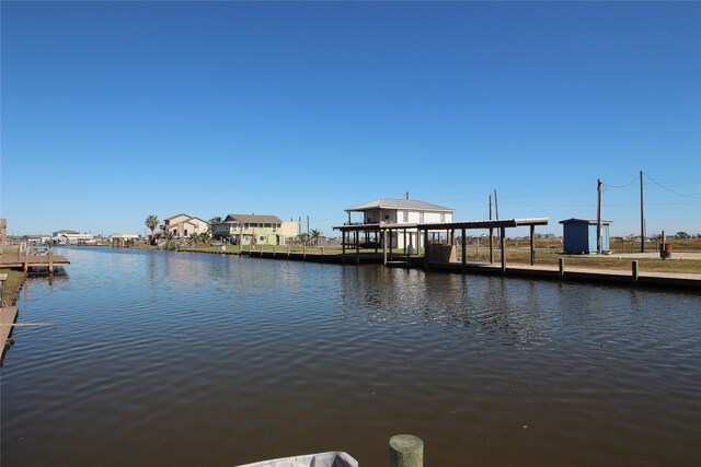 dock area with a water view