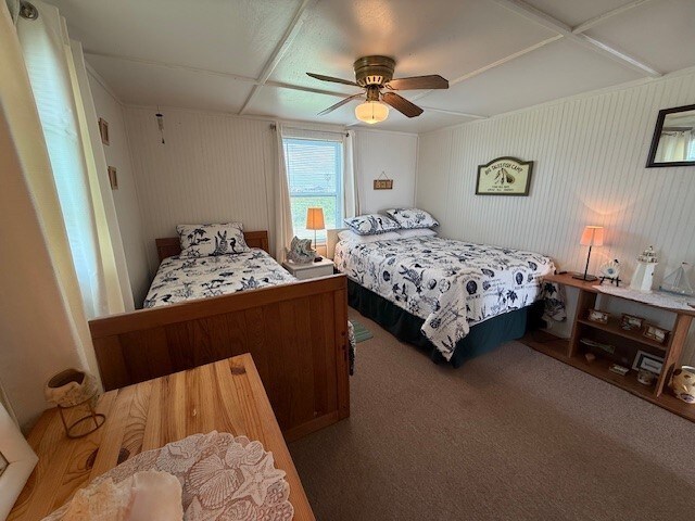 bedroom featuring carpet flooring and a ceiling fan