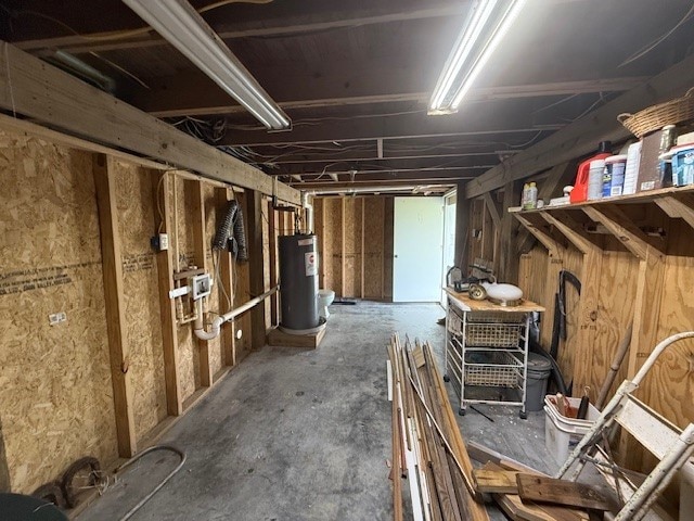 misc room featuring water heater