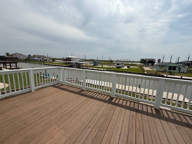 deck featuring a water view