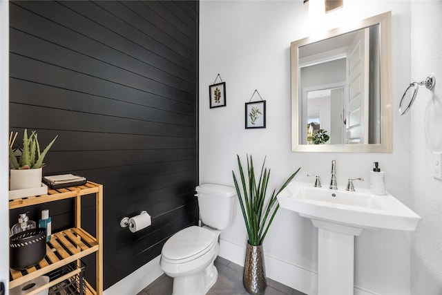 bathroom with a sink and toilet