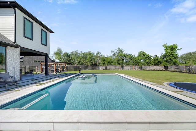 view of swimming pool featuring a patio area, a fenced backyard, a fenced in pool, and a lawn