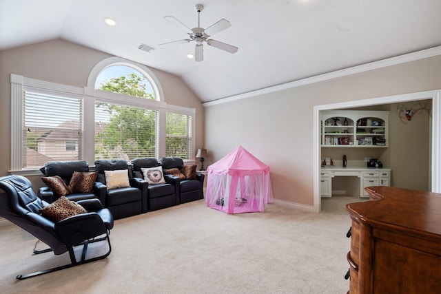 rec room featuring light carpet, ceiling fan, vaulted ceiling, and visible vents