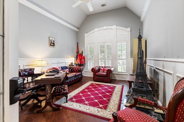 sitting room featuring a ceiling fan, wood finished floors, vaulted ceiling, and visible vents