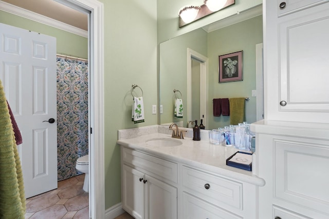 bathroom with a shower with shower curtain, vanity, ornamental molding, tile patterned floors, and toilet