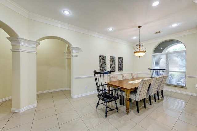 dining room with visible vents, decorative columns, arched walkways, and recessed lighting