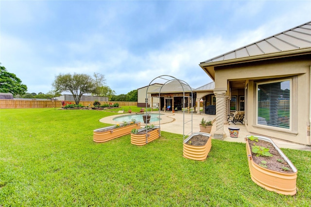 view of yard featuring a fenced backyard, a fenced in pool, and a patio