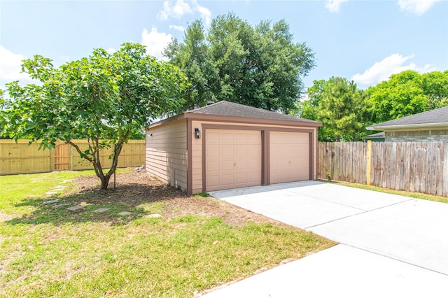 detached garage with fence