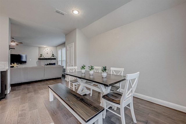 26626 Yukon Straight Dr, Richmond, TX 77406 - dining room with visible vents, baseboards, a ceiling fan, and wood finished floors