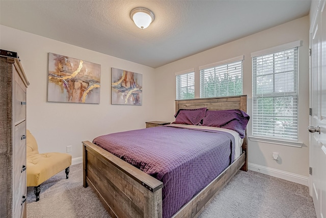 26626 Yukon Straight Dr, Richmond, TX 77406 - carpeted bedroom with baseboards and a textured ceiling