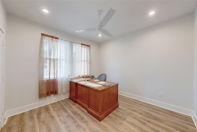office area with baseboards, recessed lighting, light wood finished floors, and ceiling fan