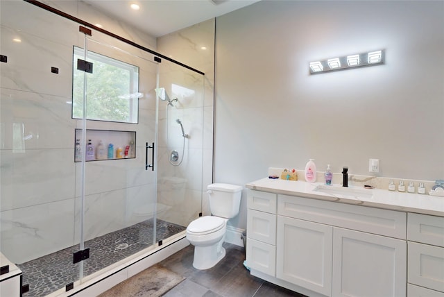 full bathroom featuring baseboard heating, a shower stall, vanity, toilet, and recessed lighting