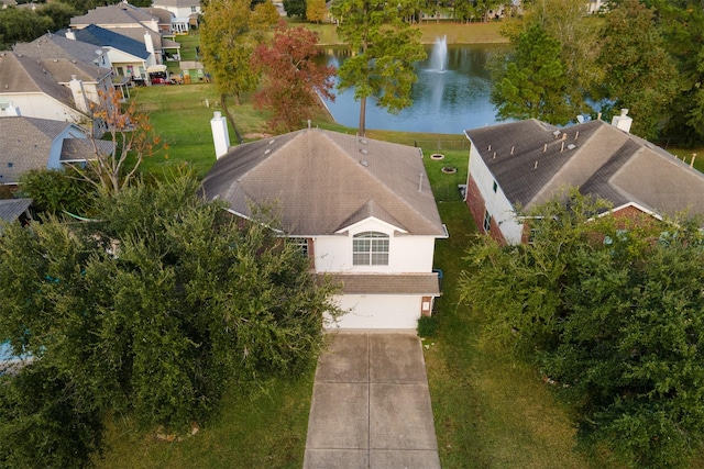 birds eye view of property featuring a water view