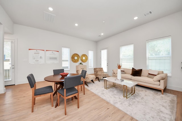 1049 Glenn Ave, Houston, TX 77088 - dining room featuring visible vents, baseboards, recessed lighting, and light wood-style floors