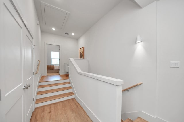 1049 Glenn Ave, Houston, TX 77088 - corridor with baseboards, light wood-type flooring, recessed lighting, attic access, and visible vents